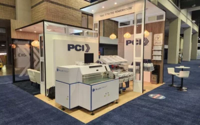 Postal Center International™ Unveils New Custom Tradeshow Booth Design and Buildout—Complete with Operational BlueCrest Elevate Sorter and Onsite Activations for High Touch, Immersive Experience